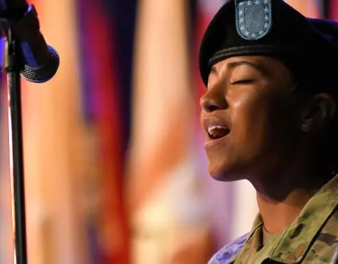 Army Band Soldier in uniform singing into microphone