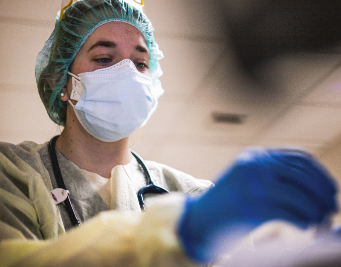 Army healthcare worker preparing for a procedure