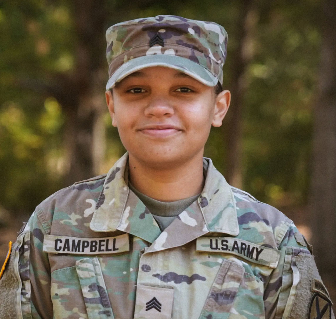 Outdoor portrait of a smiling female Soldier in combat uniform